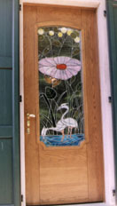 Porta blindata con vetro decorato